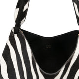 Borsa a mano Lotus con stampa zebrata in nero e bianco Khaite - donna 