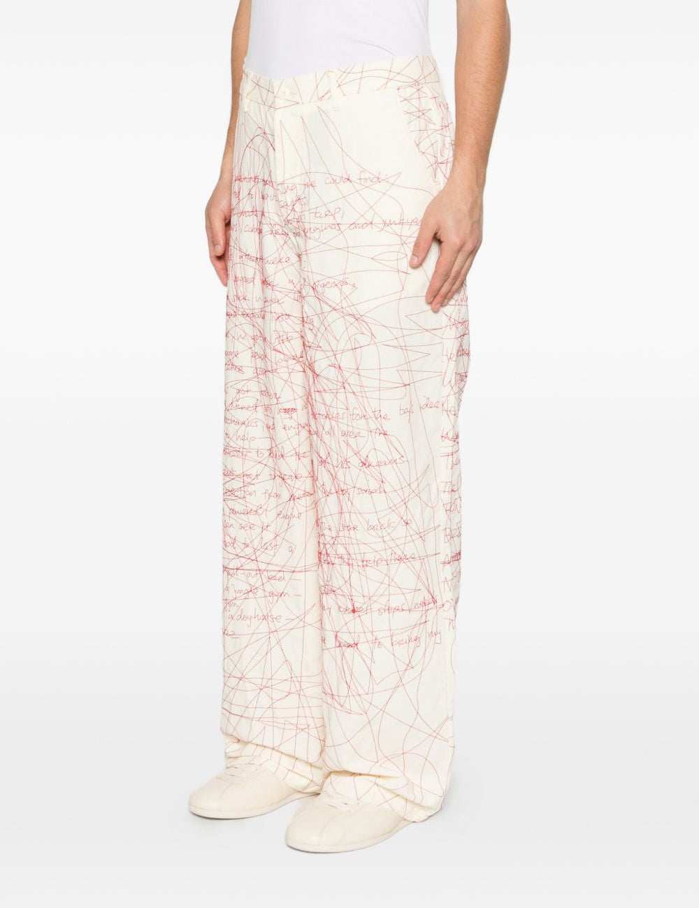 Pantaloni stampati con scrittura in bianco e rosso Kidsuper - uomo 