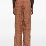 Pantaloni con motivo ricamato in marrone 