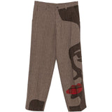 Pantaloni a righe con design patchwork  in marrone Kidsuper - uomo 