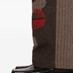 Pantaloni a righe con design patchwork  in marrone Kidsuper - uomo 