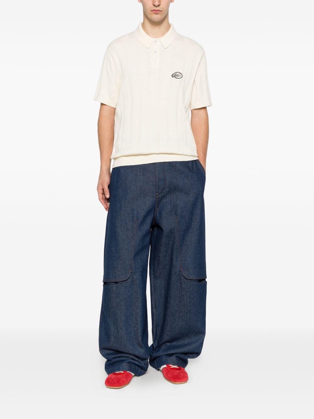 Polo con logo in bianco Kidsuper - uomo 