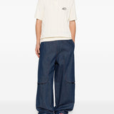 Polo con logo in bianco Kidsuper - uomo 