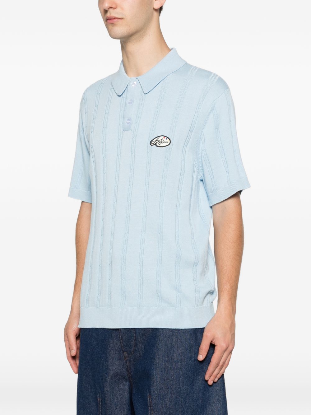 Polo a righe ricamata in azzurro Kidsuper - uomo 