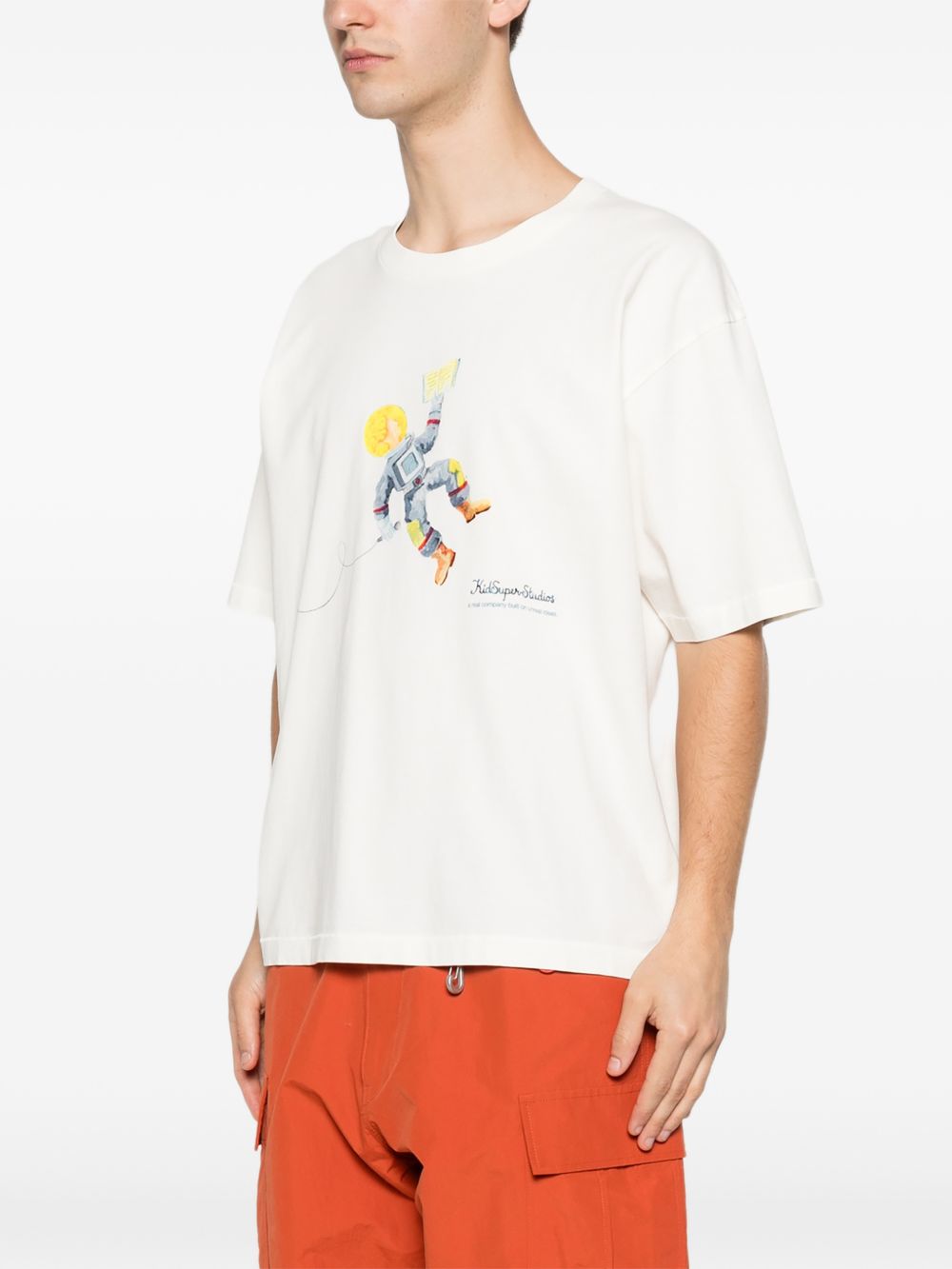 T-shirt con stampa di UN astronauta in bianco Kidsuper - uomo 