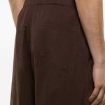 Pantaloni Melrose con ricamo in marrone Laneus - uomo 