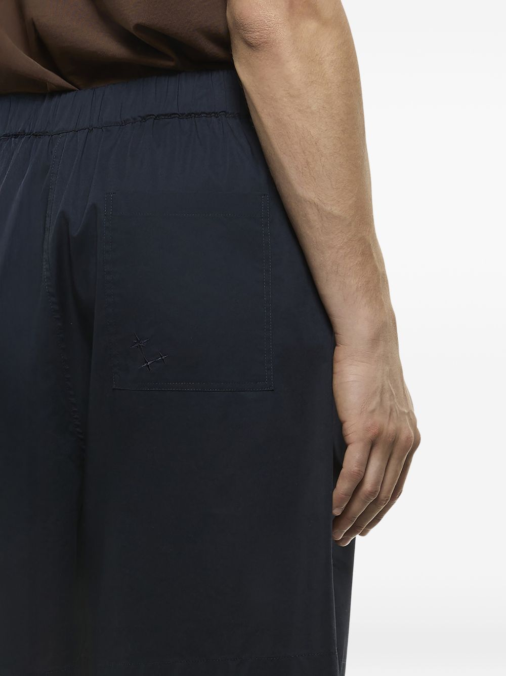 Shorts elasticizzati ricamati melrose in nero Laneus - uomo 