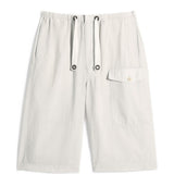 Shorts con tasca cargo in beige Lemaire - uomo 
