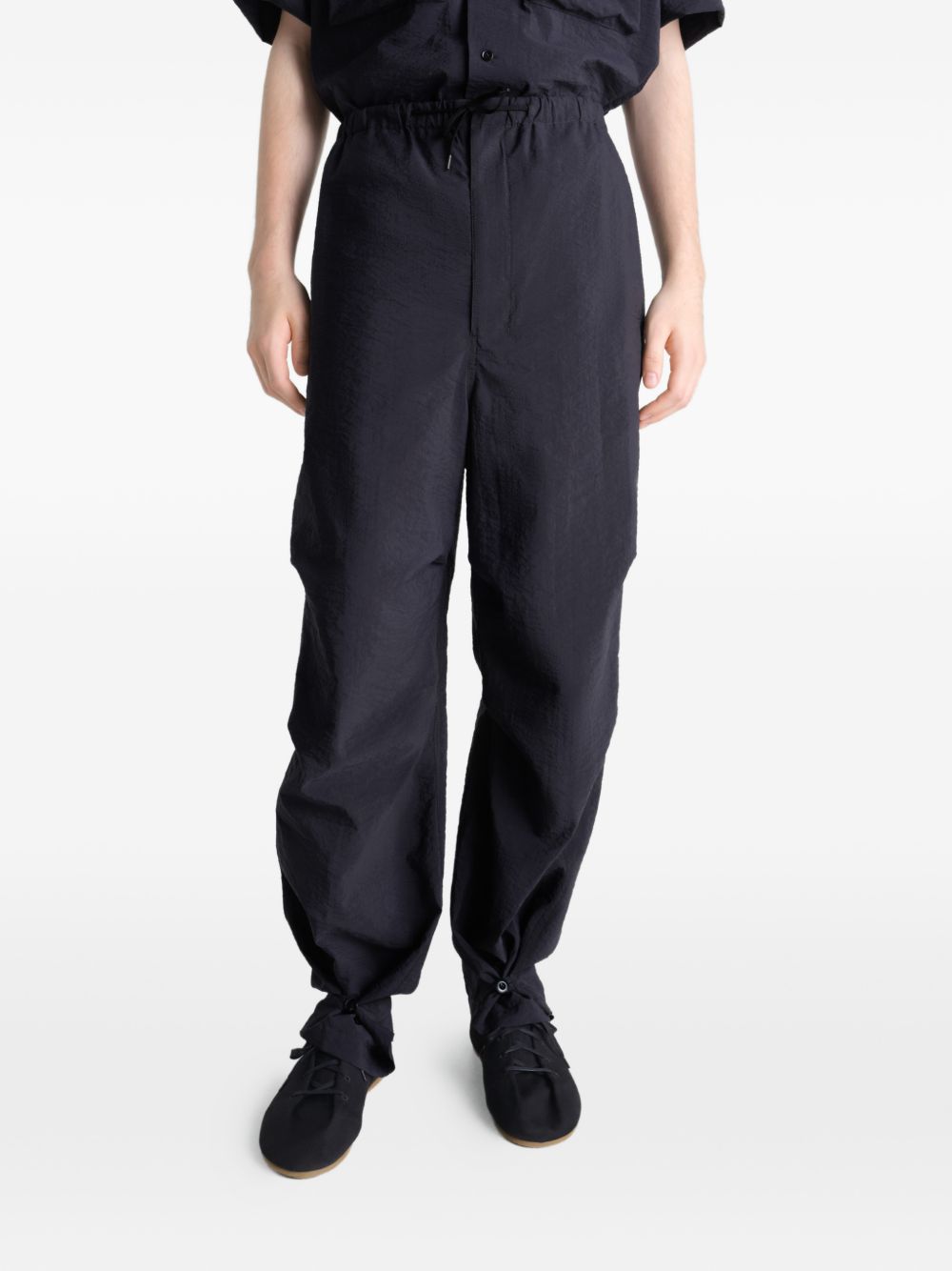 Pantaloni con tasche in nero LEMAIRE - uomo 
