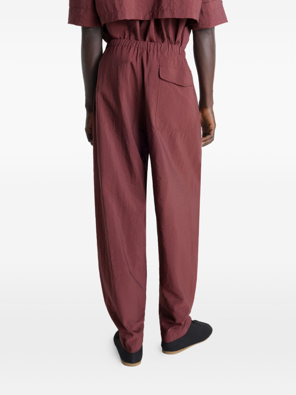 Pantaloni con pieghe in rosso Lemaire - uomo 