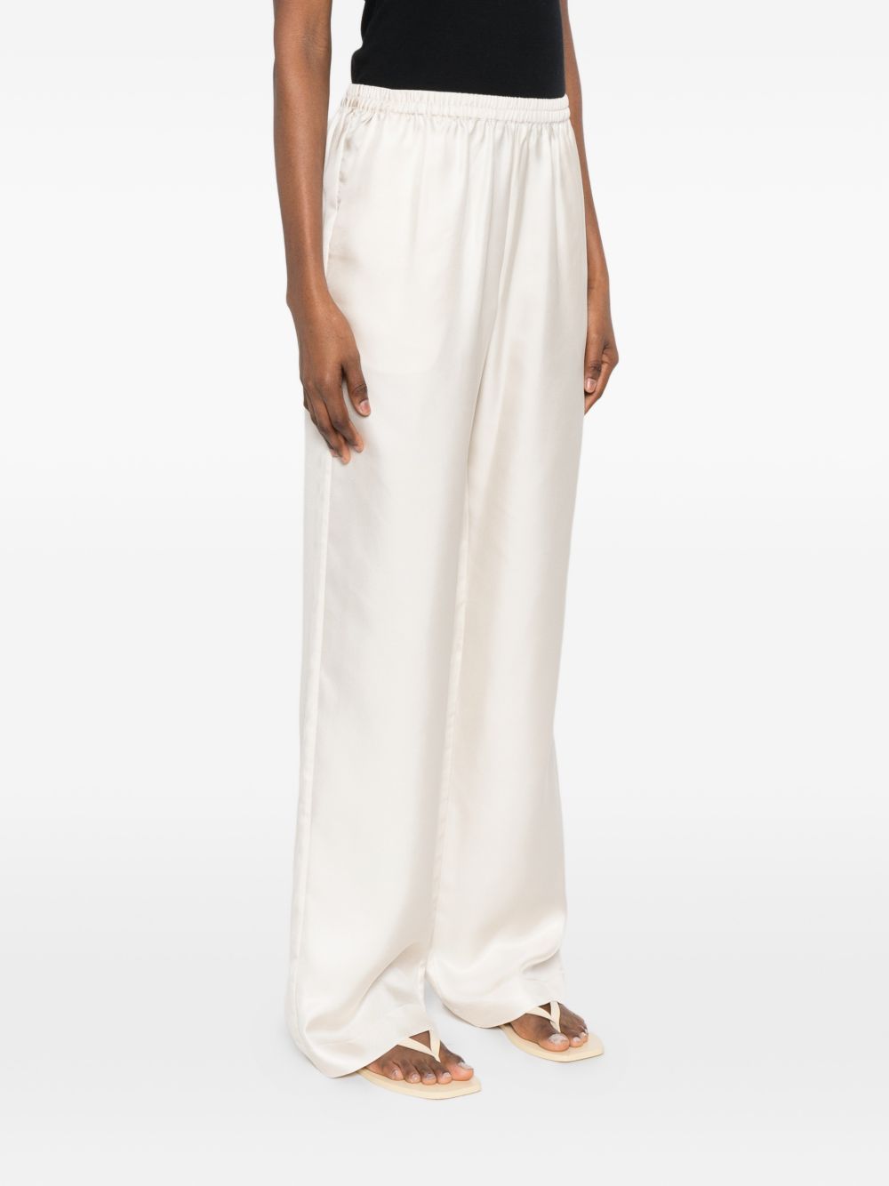 Pantaloni Alera con vita elasticizzata in beige Loulou de saison - donna 