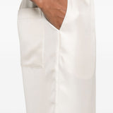 Pantaloni Alera con vita elasticizzata in beige Loulou de saison - donna 