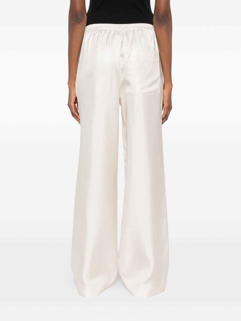 Pantaloni Alera con vita elasticizzata in beige Loulou de saison - donna 