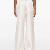Pantaloni Alera con vita elasticizzata in beige Loulou de saison - donna 