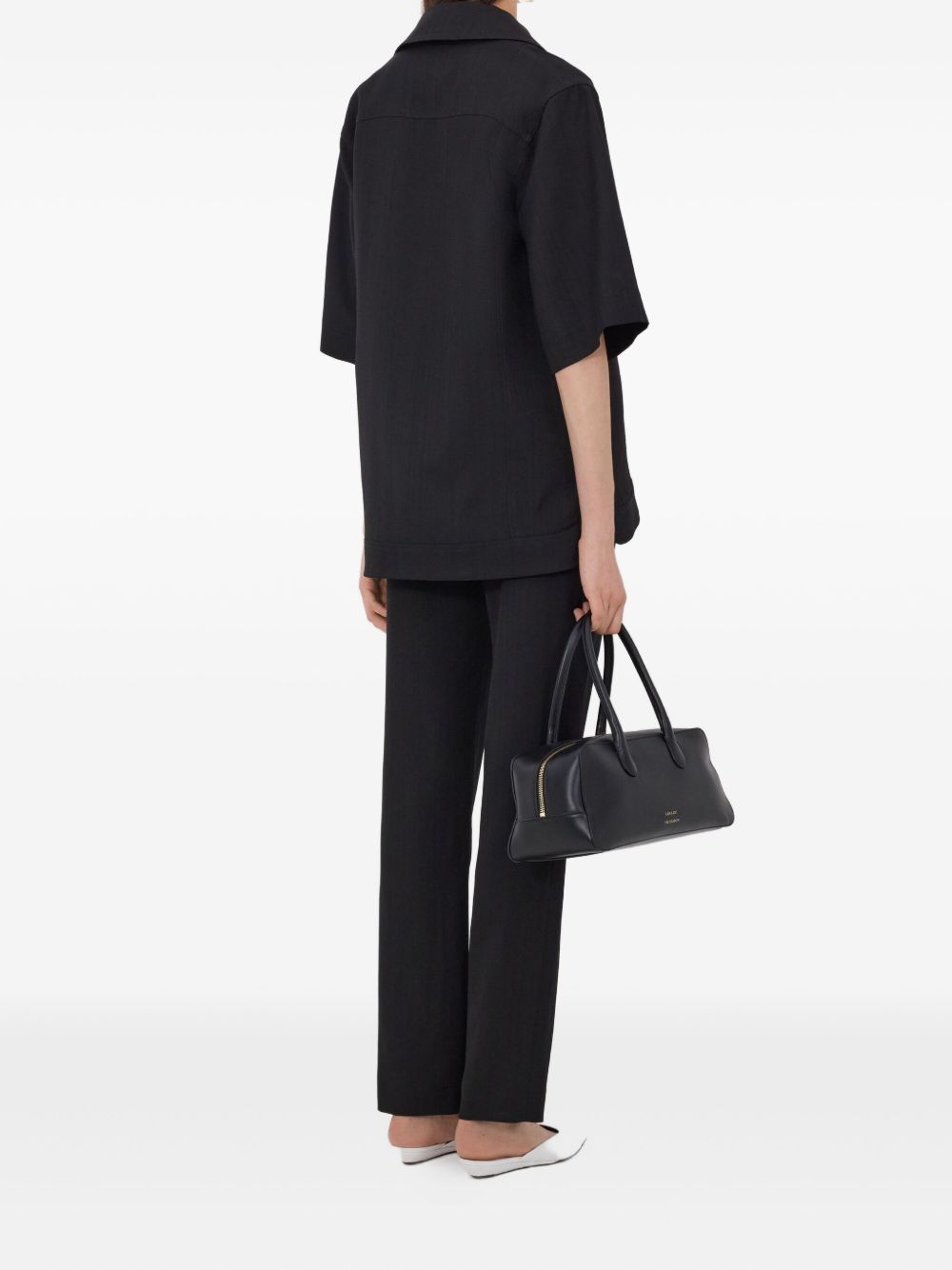 T-shirt con scollo a v ermo in nero Loulou de saison - donna 