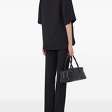 T-shirt con scollo a v ermo in nero Loulou de saison - donna 