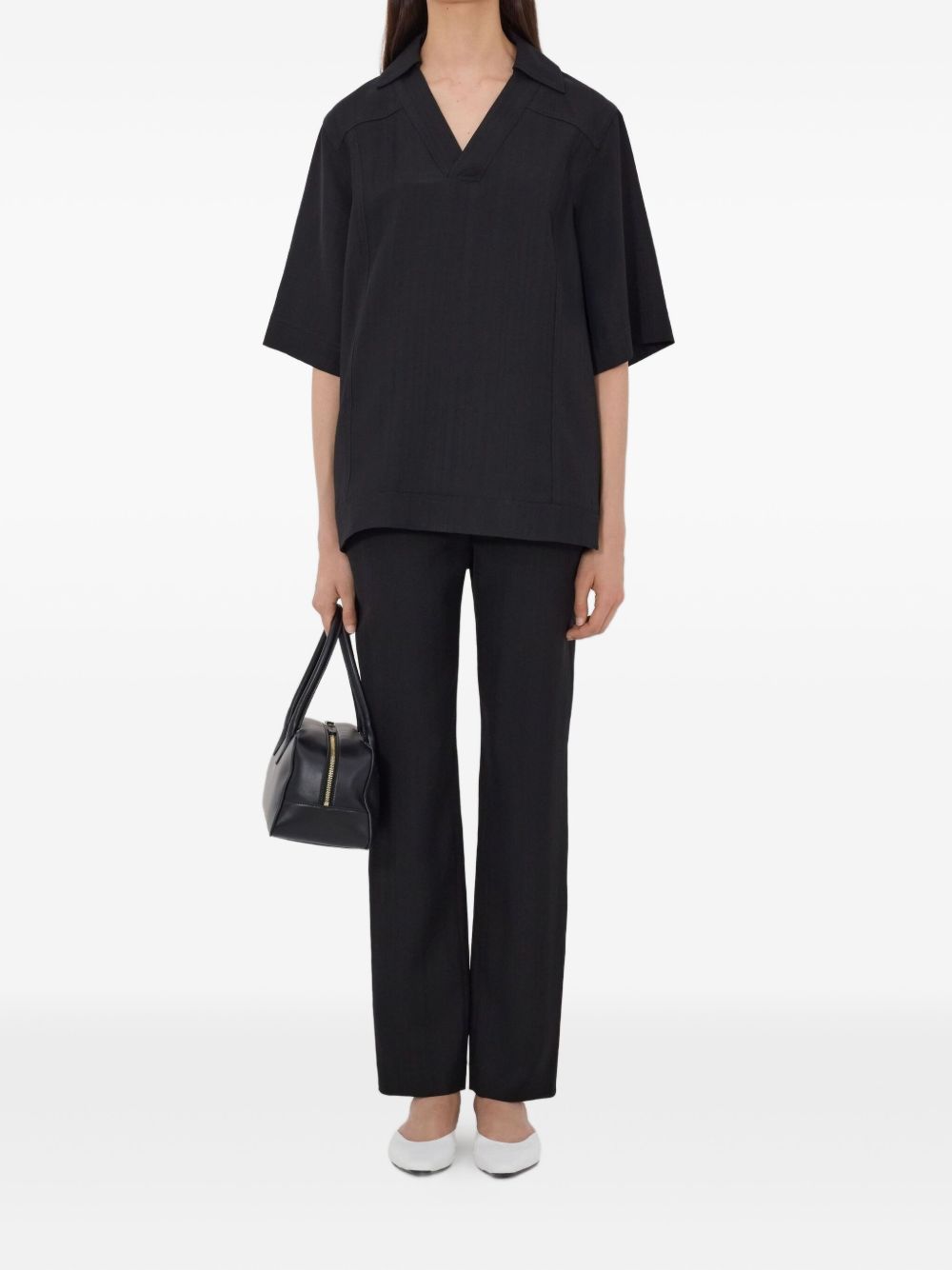 T-shirt con scollo a v ermo in nero Loulou de saison - donna 