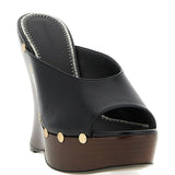 Mules in pelle con borchie e punta aperta in nero Magda butrym - donna 