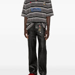 Polo a righe con logo in grigio e nero Martine rose - uomo 