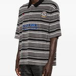 Polo a righe con logo in grigio e nero Martine rose - uomo 
