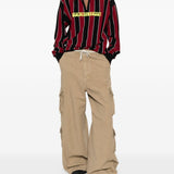 Polo a righe con zip in rosso e nero Martine rose - unisex 