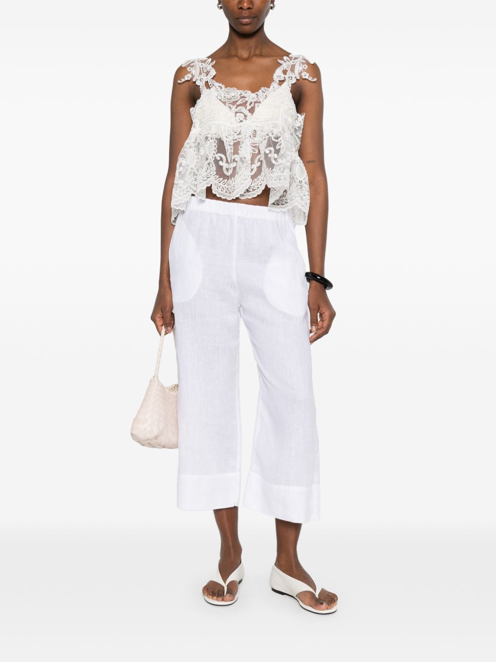 Top con lacci in pizzo in bianco Maurizio - donna 