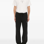 Pantaloni con applicazione in nero Mm6 maison margiela - uomo 