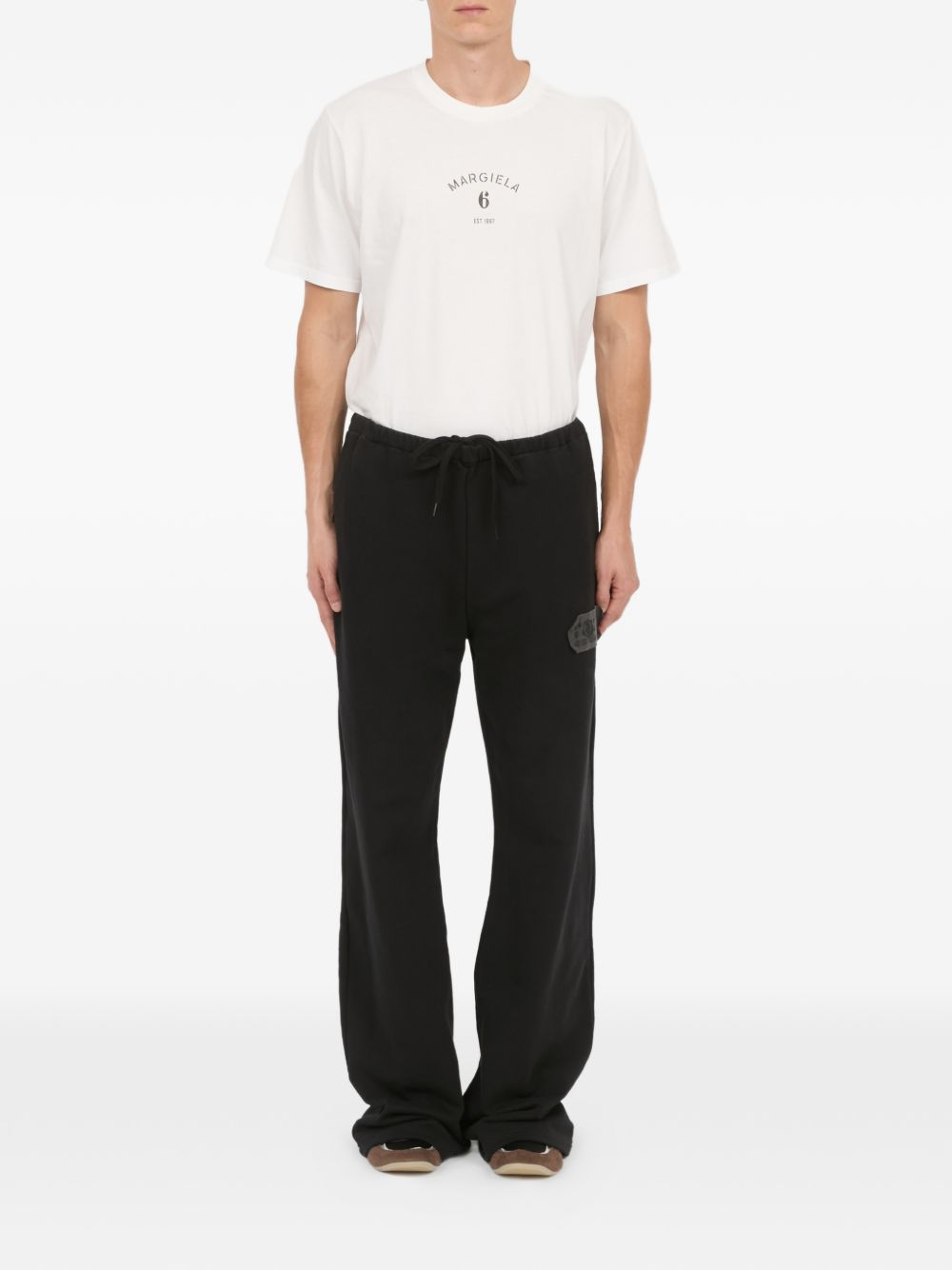 Pantaloni con applicazione in nero Mm6 maison margiela - uomo 