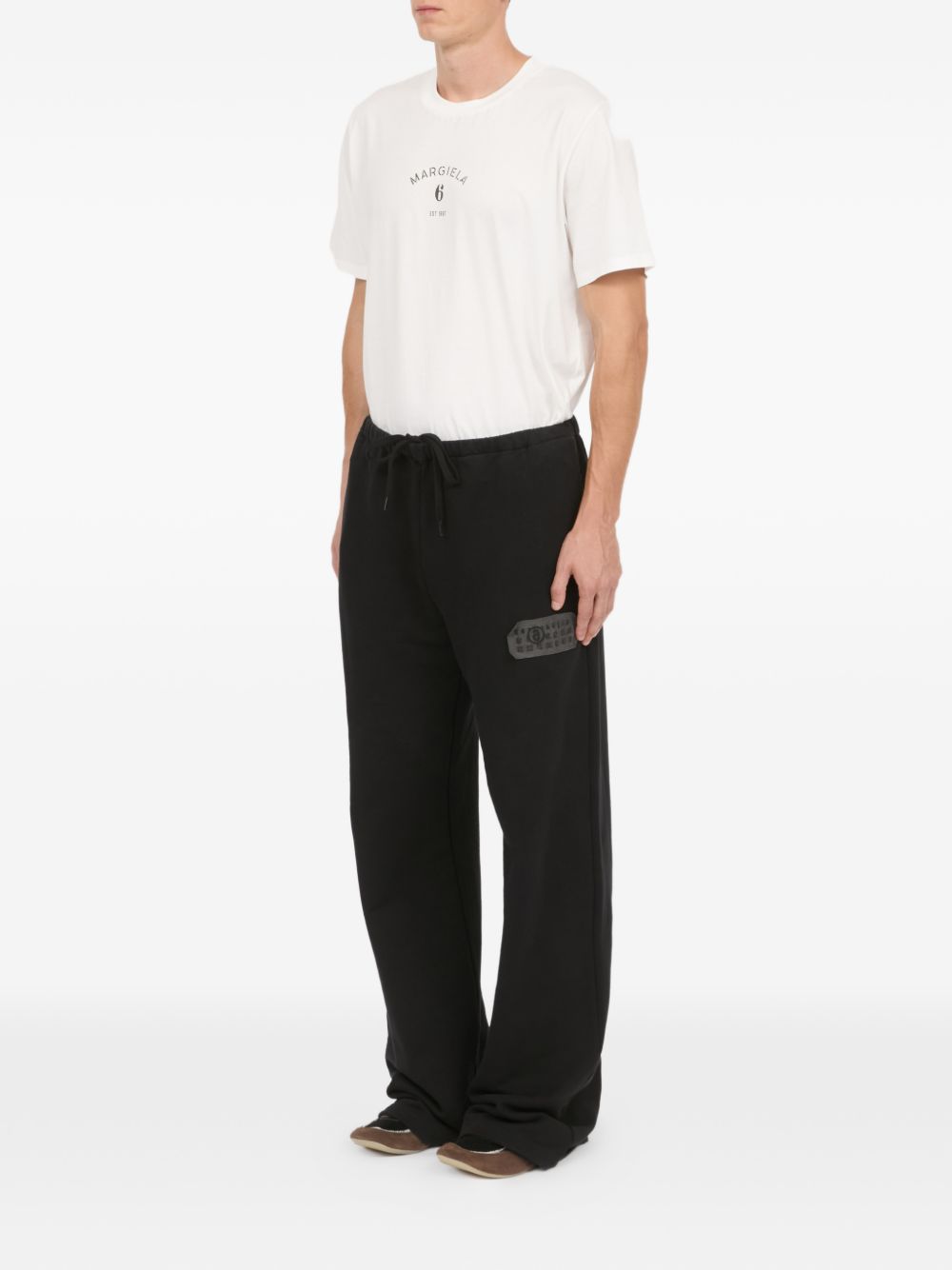 Pantaloni con applicazione in nero Mm6 maison margiela - uomo 