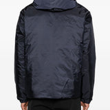 Piumino con cappuccio e logo in blu Moncler - uomo 