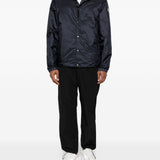Piumino con cappuccio e logo in blu Moncler - uomo 