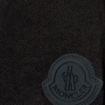 Polo con applicazione logo in nero Moncler - uomo 
