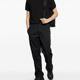 Polo con applicazione logo in nero Moncler - uomo 