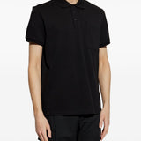 Polo con applicazione logo in nero Moncler - uomo 