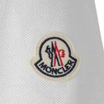 Polo con logo ricamato in bianco Moncler - uomo 