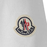 Polo con logo ricamato in bianco Moncler - uomo 