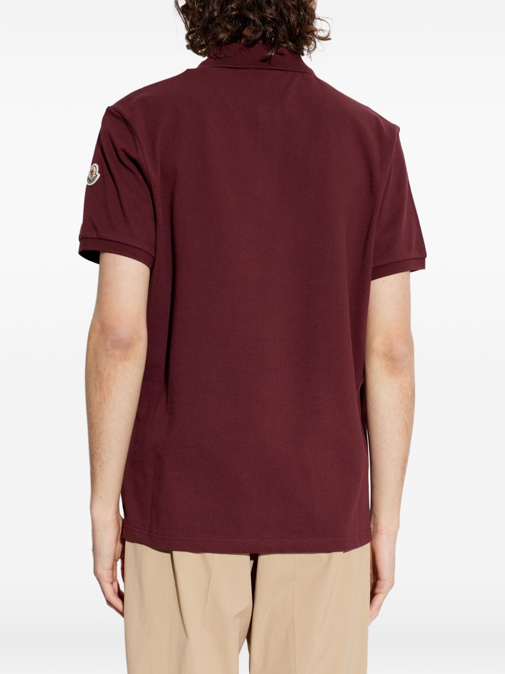Polo con dettaglio a righe in piquet in rosso Moncler - uomo 