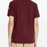 Polo con dettaglio a righe in piquet in rosso Moncler - uomo 