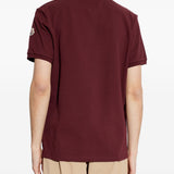 Polo con dettaglio a righe in piquet in rosso Moncler - uomo 