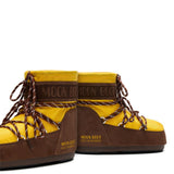 Stivali da neve con lacci e logo in giallo e marrone Moon boot x guest in residence - donna 
