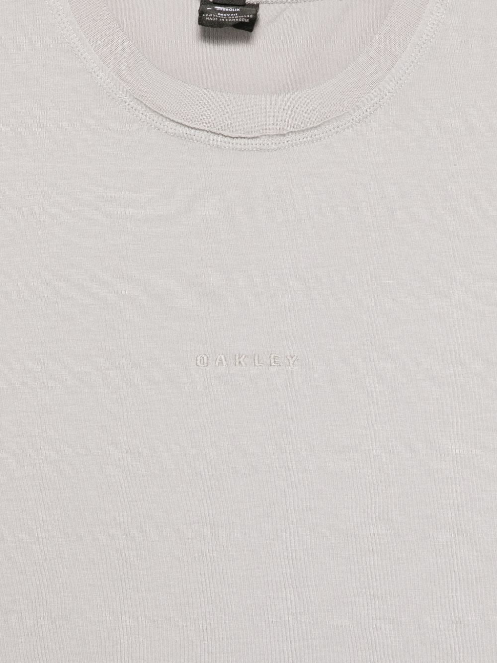 Top smanicato in grigio Oakley - uomo 