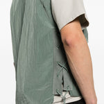 Gilet con tasca con zip in verde Oakley - uomo 