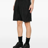 Shorts con vita elasticata in nero Oakley- uomo 