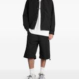 Pantaloncini con cintura e tasche con zip in nero Oamc peacemaker - uomo 
