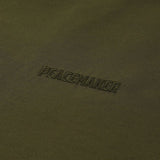 Camicia con grafica in verde Oamc peacemaker - uomo 