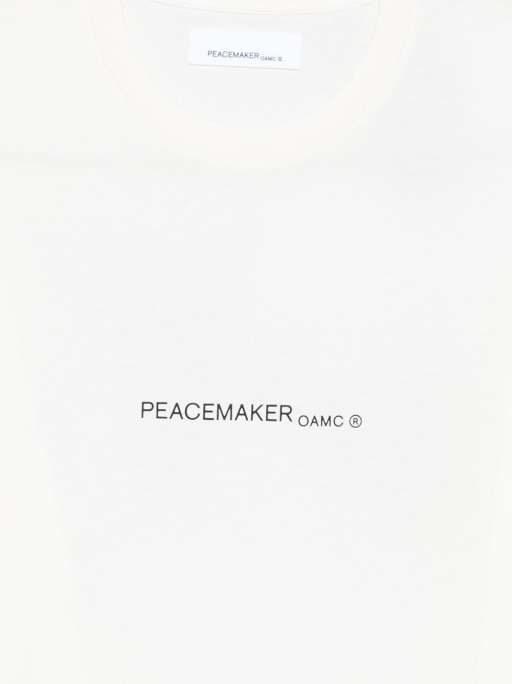 T-shirt con stampa grafica in bianco Oamc peacemaker - uomo 