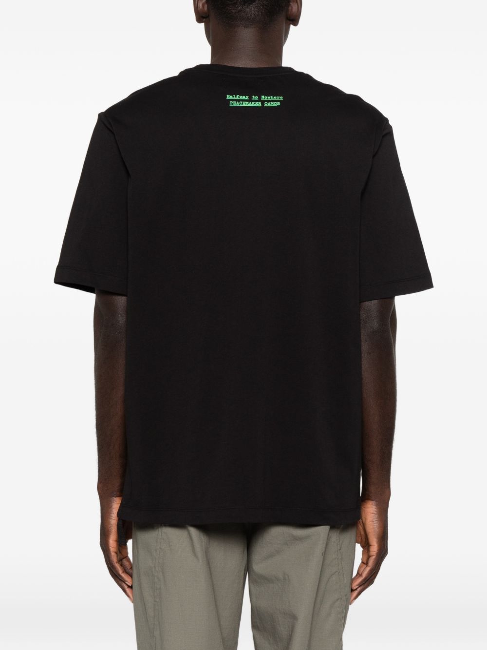 T-shirt con stampa grafica in nero Oamc peacemaker - uomo 