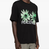 T-shirt con stampa grafica in nero Oamc peacemaker - uomo 