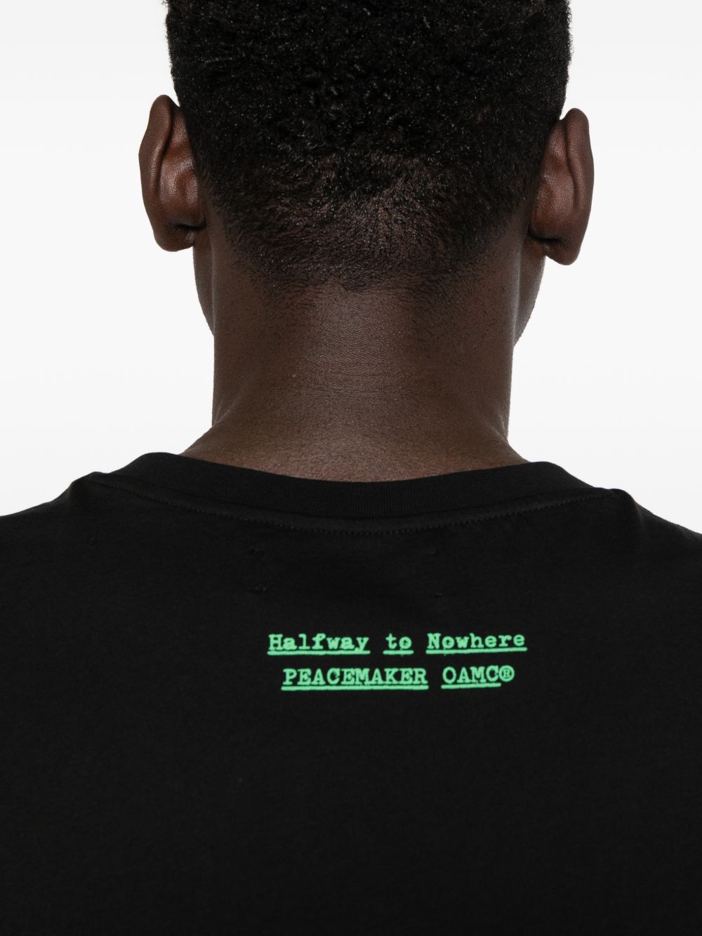 T-shirt con stampa grafica in nero Oamc peacemaker - uomo 
