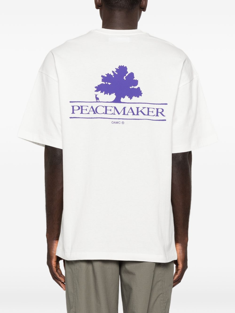 T-shirt con stampa del logo in bianco Oamc peacemaker - uomo 